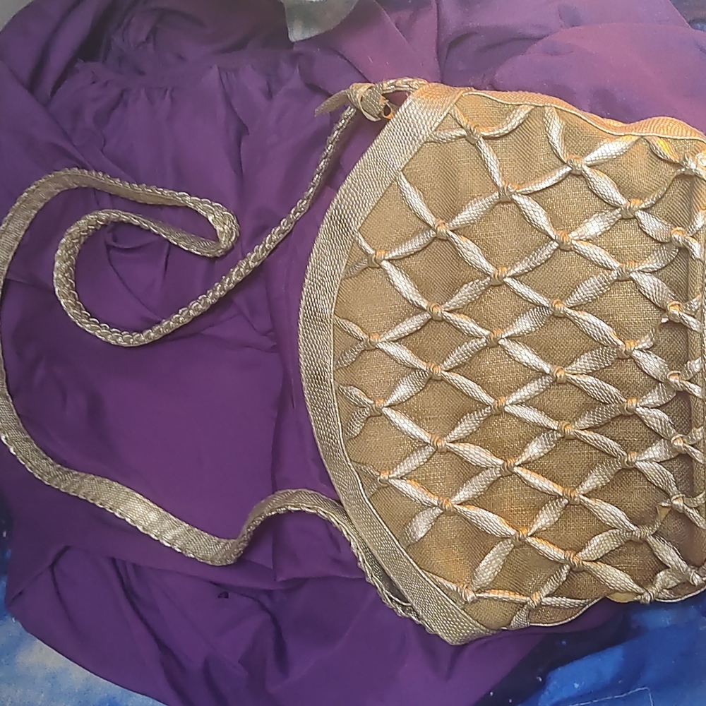 Gold & Cream Tianni purse w/ lattice knot design  Never been used